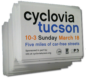A multi-color yard sign for local cycling event. 