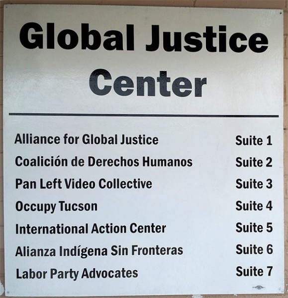 Large Global Justice Center sign made at Tucson print shop. The Gloo Factory.